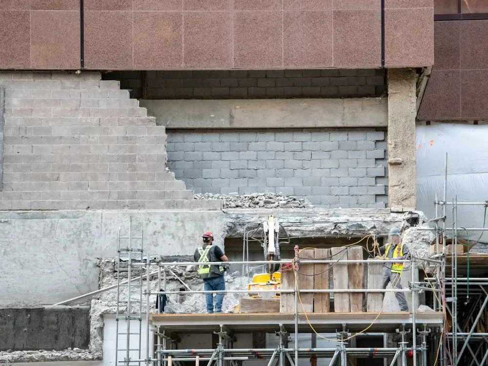 Workers and scaffolding at a construction site