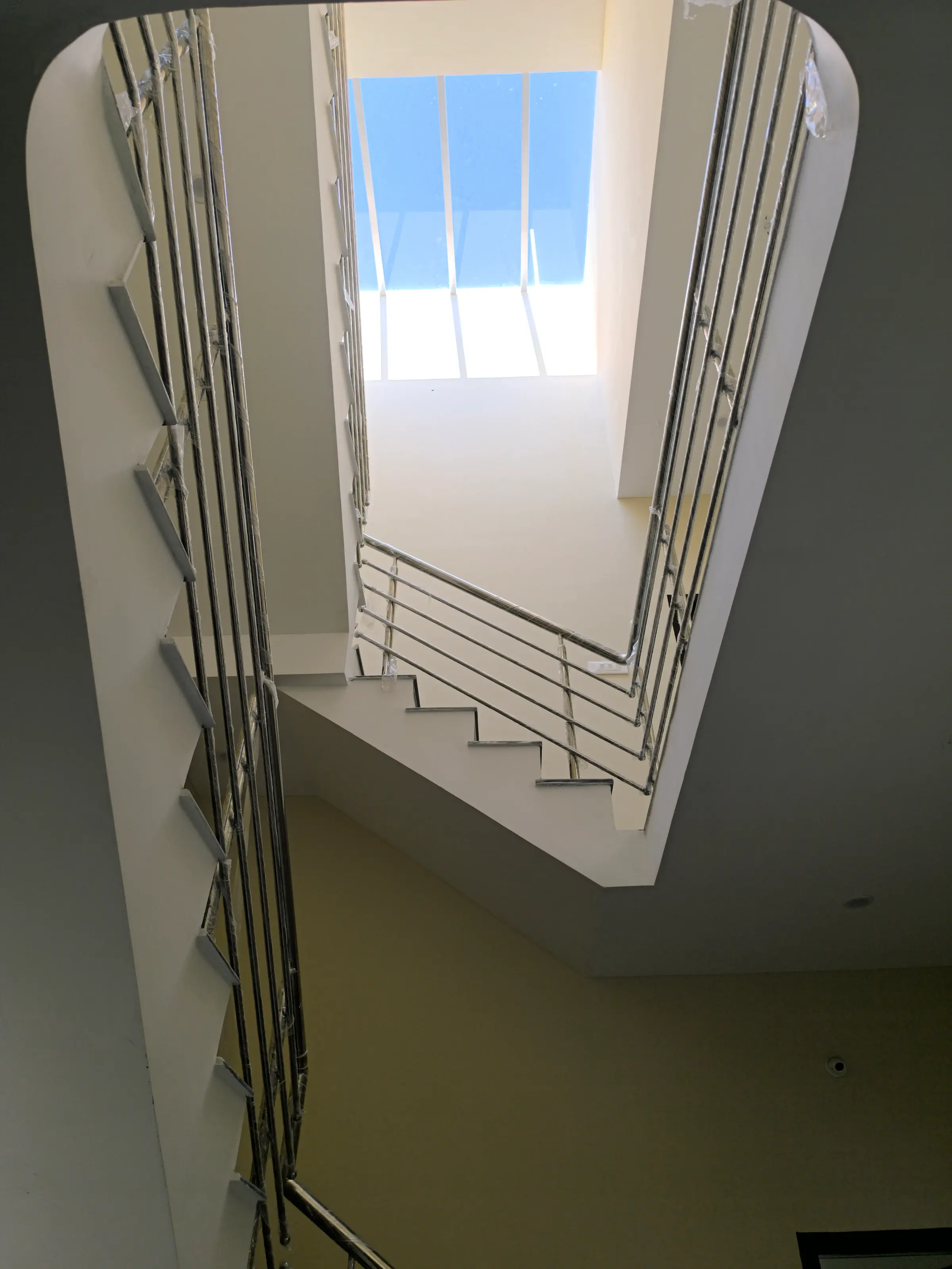 Completed residential home: skylight and upper staircase