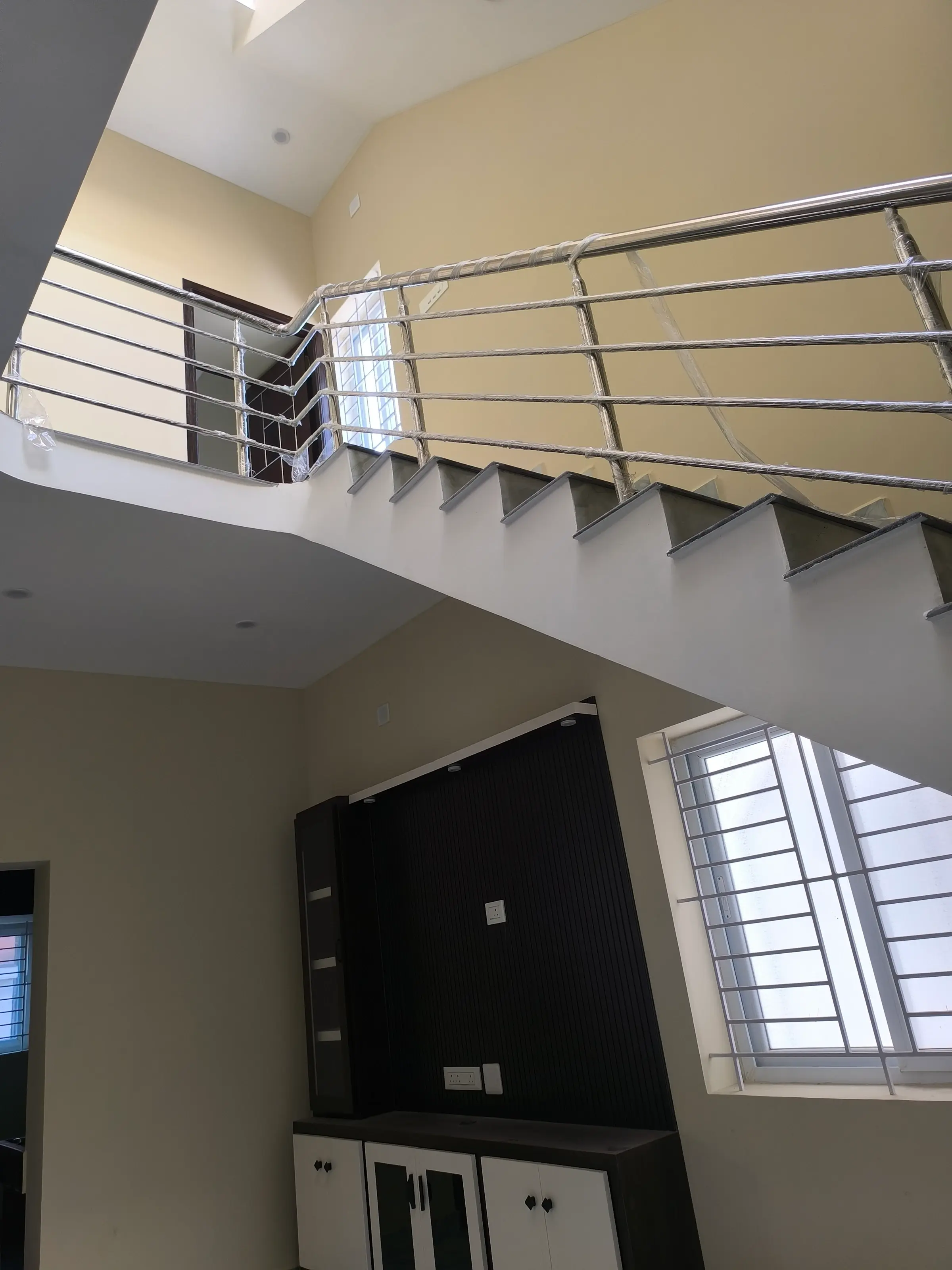 Completed residential home: staircase and living room